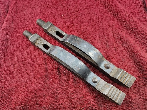 Pair spring locking dogs - pair,